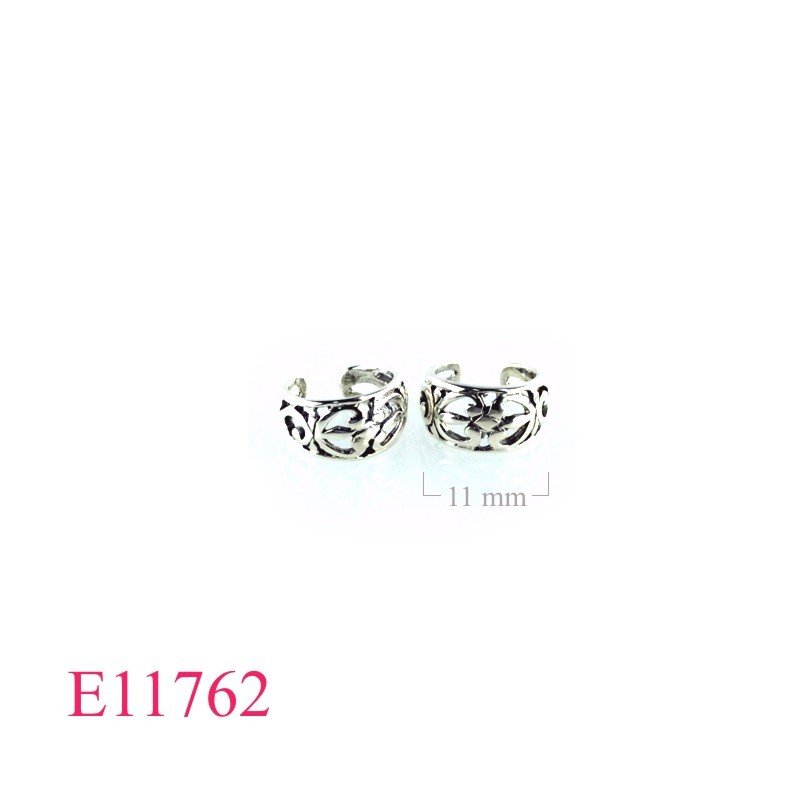 Earrings, cut out design cuff earrings.