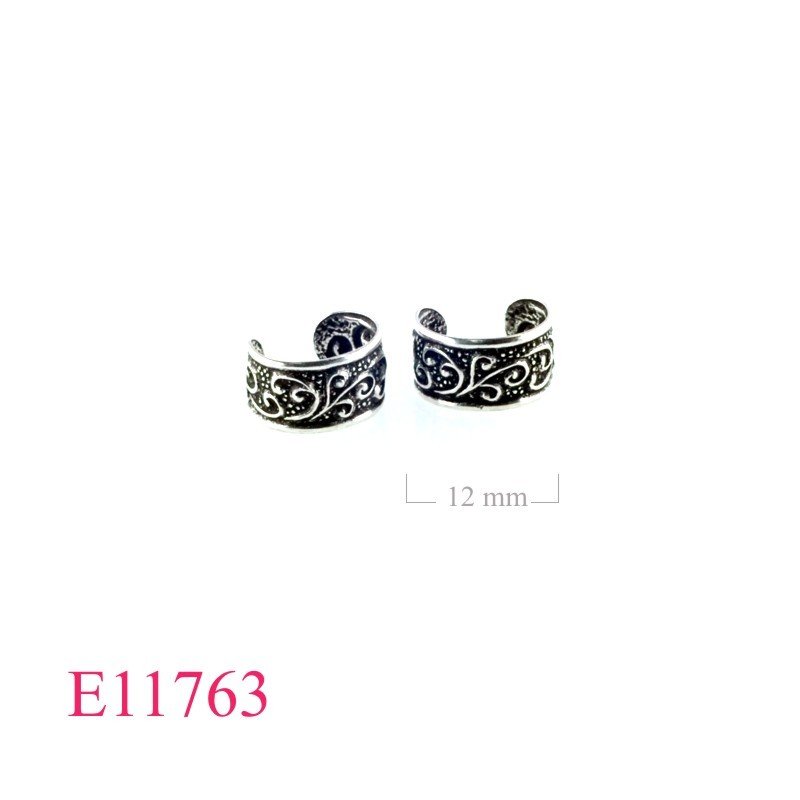 Earrings, ear cuff.