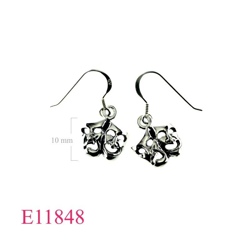 Earrings, happy-sad faces.