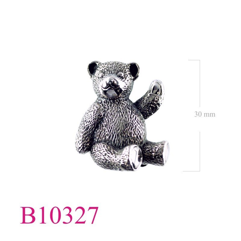 Brooch, teddy bear.