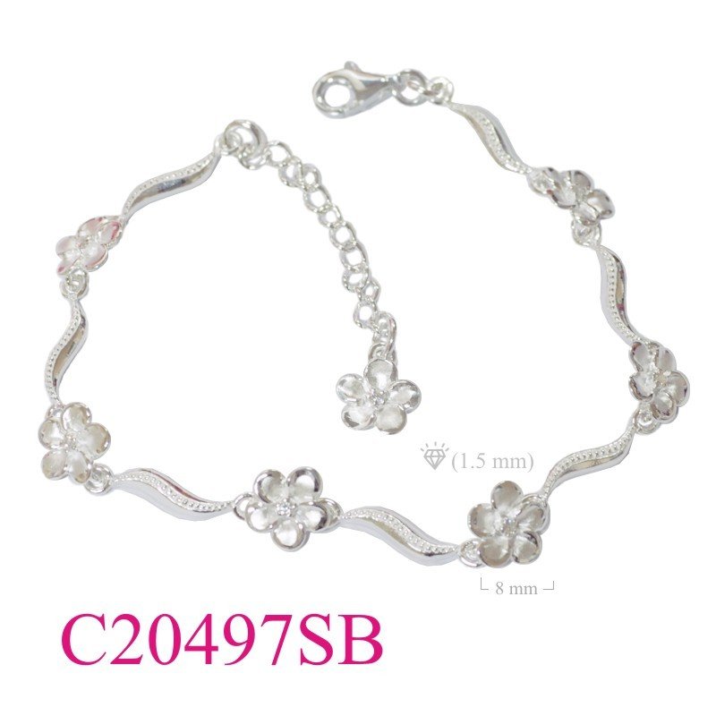 Bracelet, 7 sandblast champac flowers with small stone.