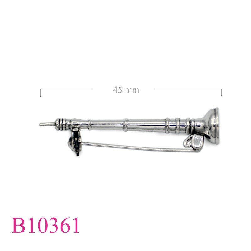 Brooch, flute.