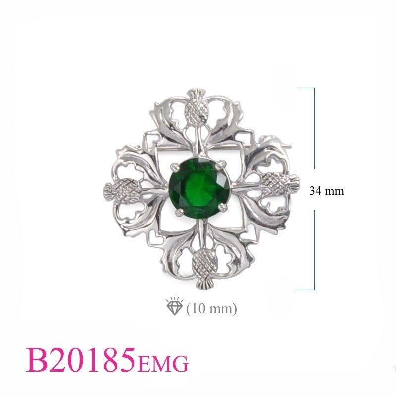 Brooch, 4 Thirstles with Emerald Glass round stone.