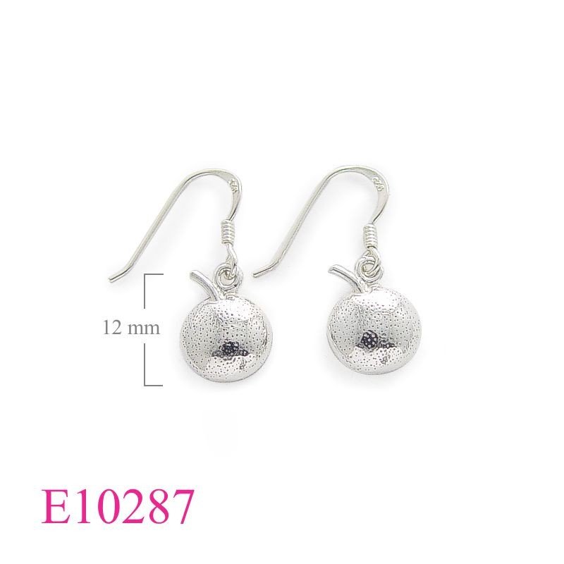 Earrings, an orange.