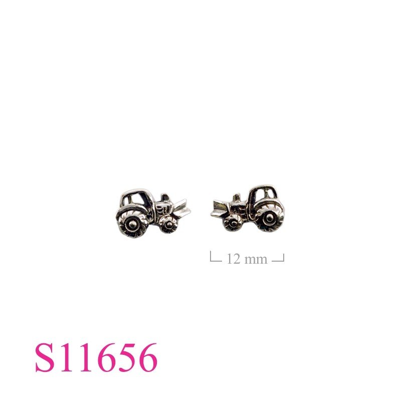 Earrings, tractor.