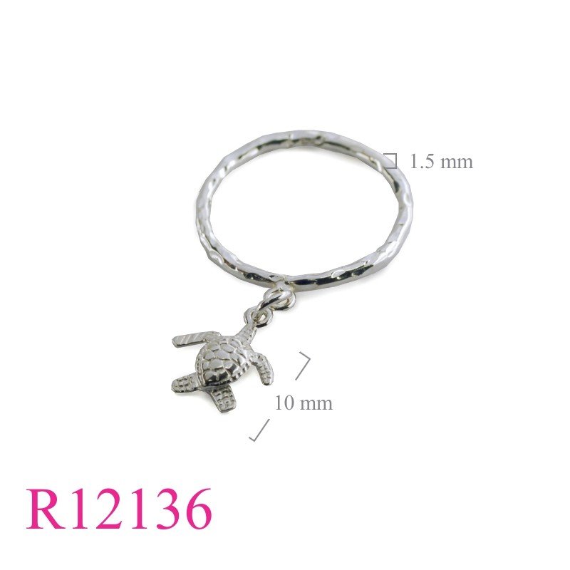 Ring, hammered wire and hanging turtle.