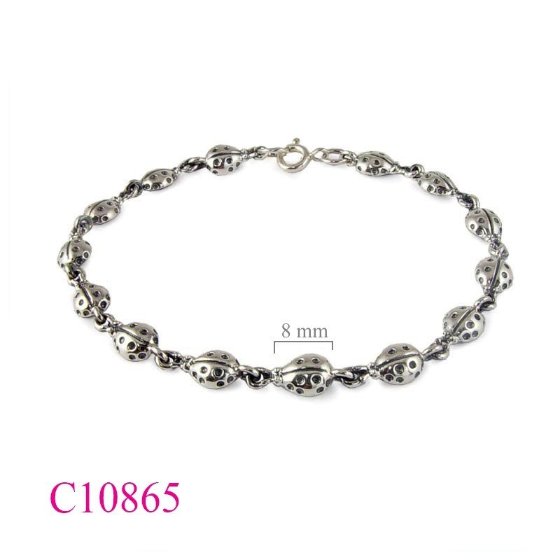 Bracelet, lady bugs.