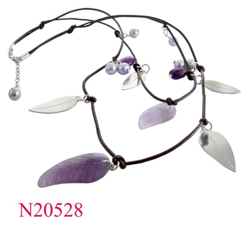 Necklace, stone and silver leaves on leather thread.