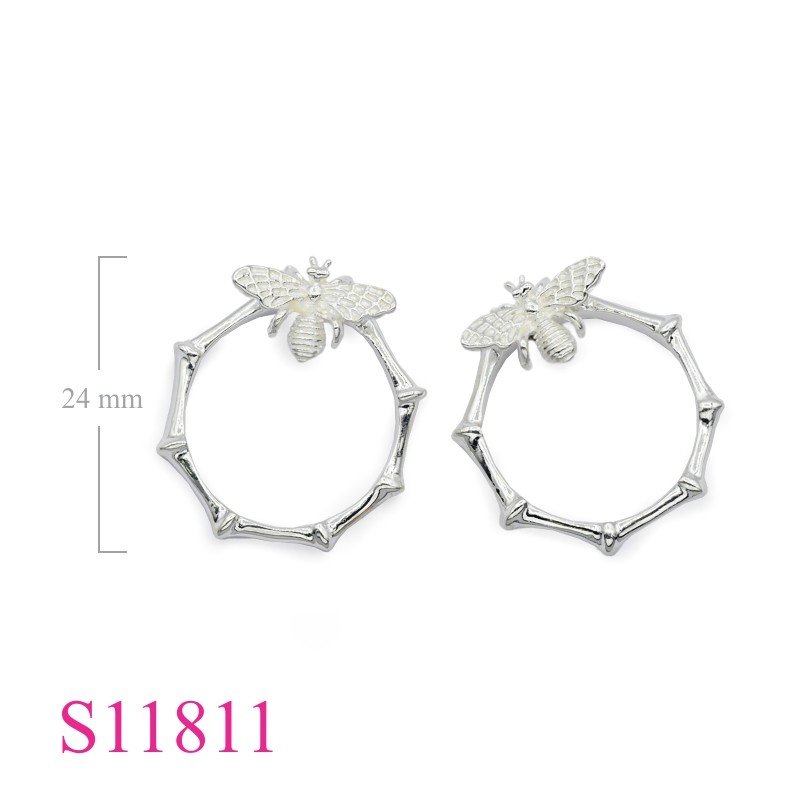 Earrings, bee on bamboo hoop.
