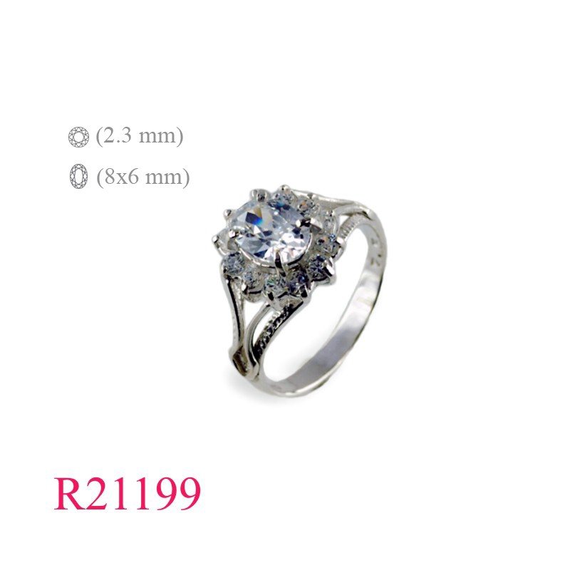 <p>Ring, 8x6mm oval and small CCZs around.</p>