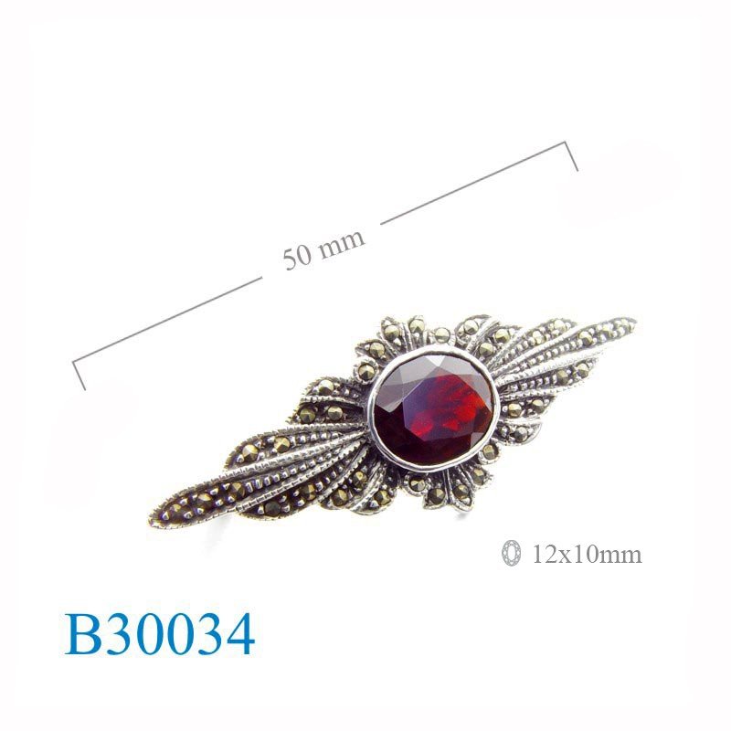 Brooch, marcasite 12x10mm oval Real  stone.