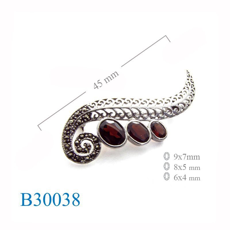 Brooch, marcasite leaf shape with 3 oval Real Garnet stone.