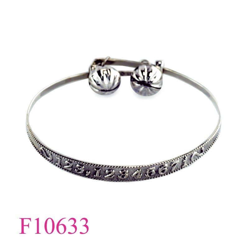 Bangle, "123…" adjustable and 2 jingle balls.