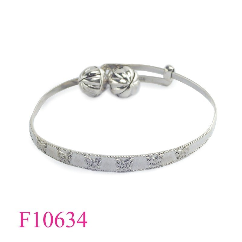 Bangle, butterflies adjustable and 2 jingle balls.