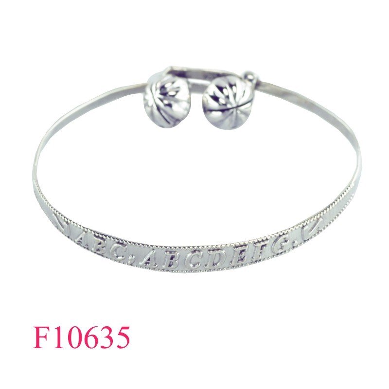Bangle, "ABC…" adjustable and 2 jingle balls.