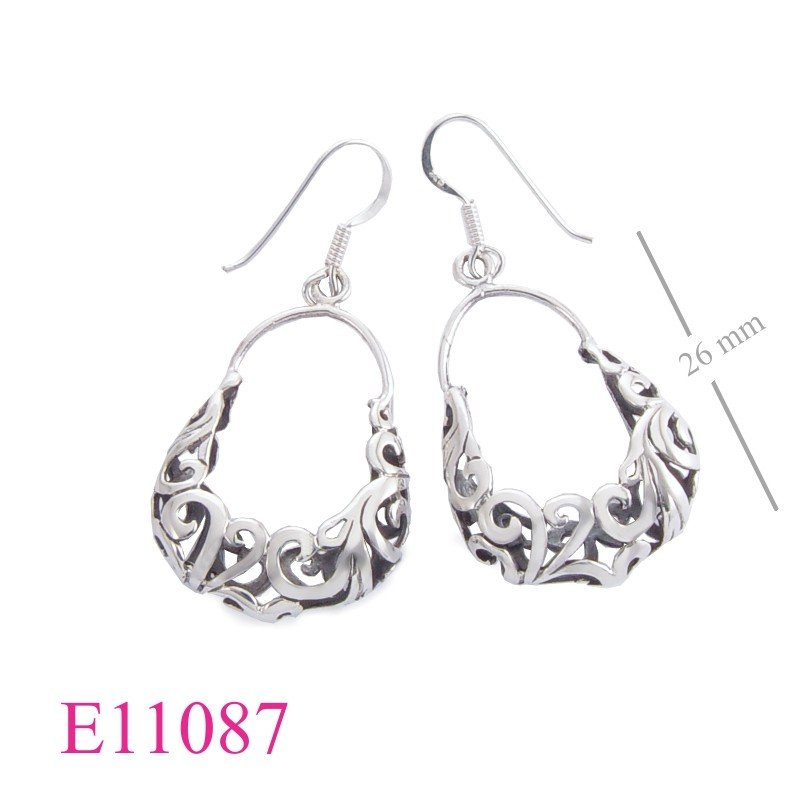 Earrings, cut out design hoop.