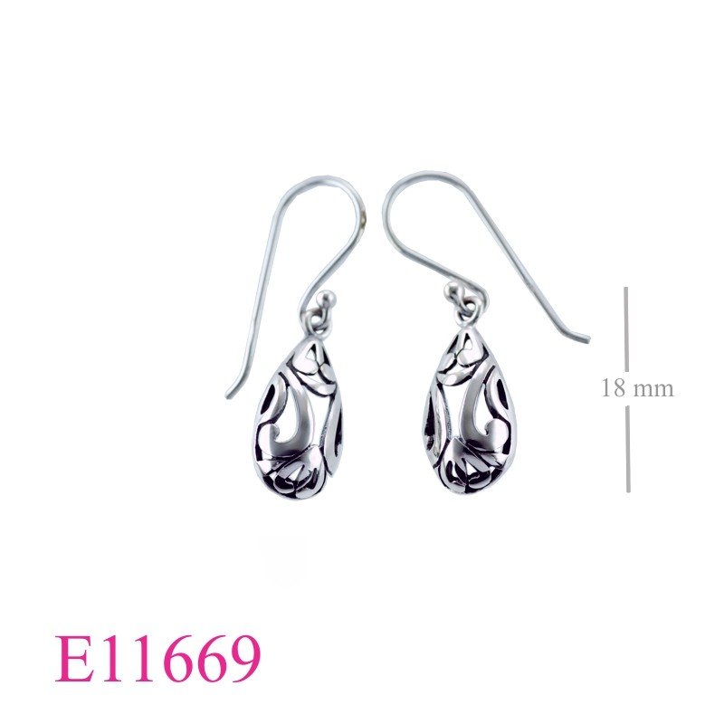 Earrings, cut out puff drop design.