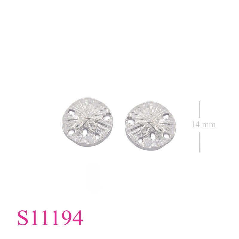 Earrings, sand dollar.