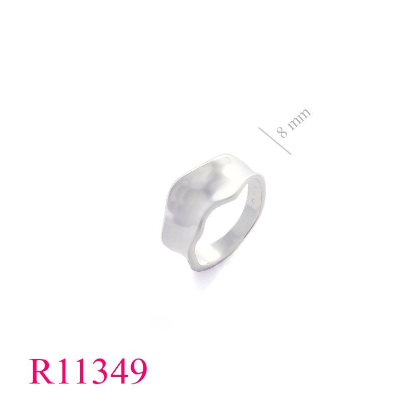 <p>Ring, wavy edges.</p>