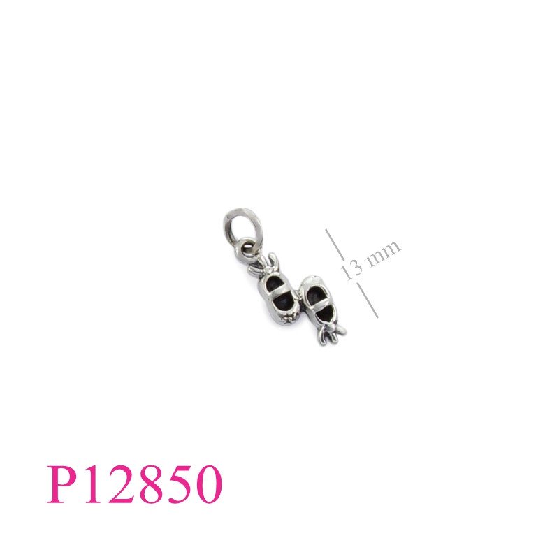 <p>Pendant, baby shoes.</p>