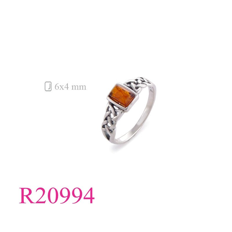 <p>Ring, celtic with rectangular Amber stone.</p>