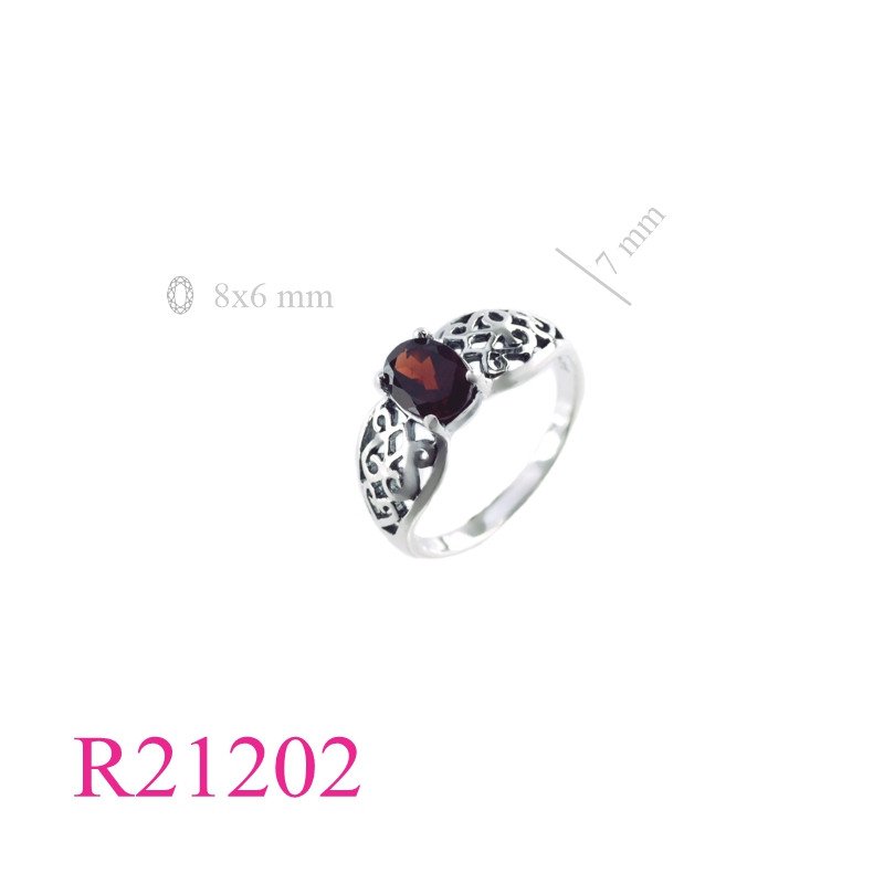 <p>Ring, opened work design with  8x6mm oval Real Garnett stone.</p>